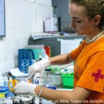 Iris, working in the clinic to help the doctor.