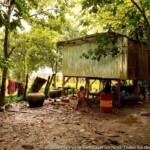 Elevated house built in Cambodian style, with wood and metal sheet.