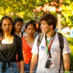 Pelayo talking with one teen during an outing.